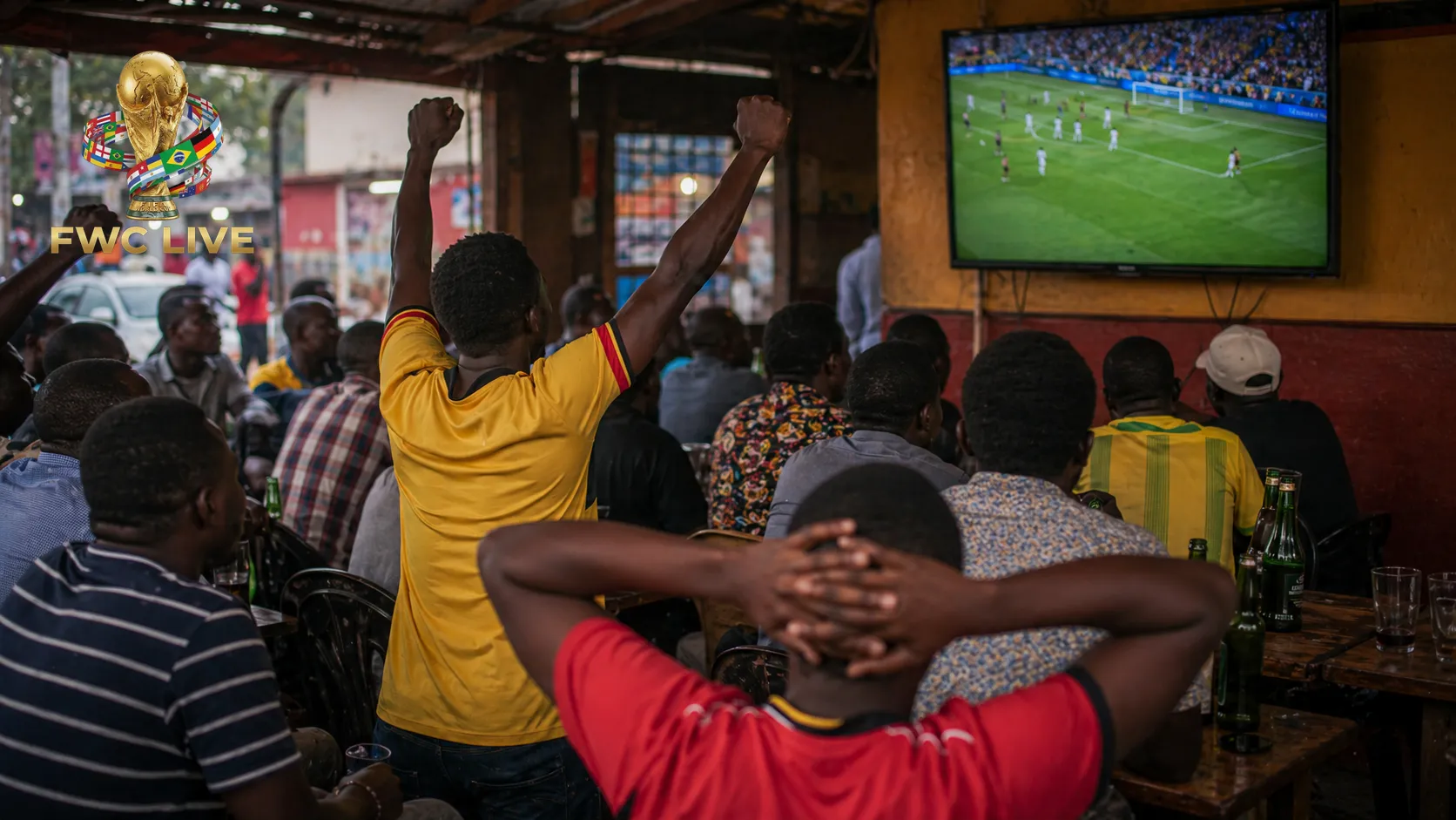 Zambia football fans watching FIFA World Cup 2026 coverage in a Lusaka sports cafe