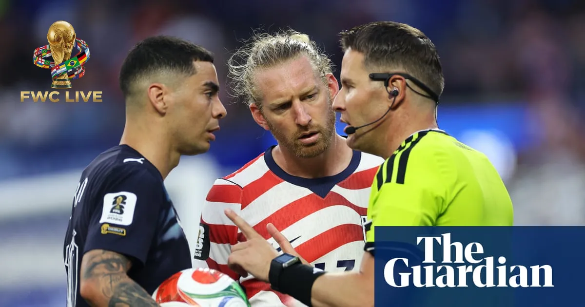 Tim Ream speaks to the referee after a VAR review in the United States vs Paraguay match